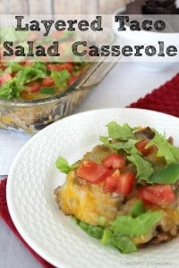 My family of boys enjoys this easy to make Layered Taco Salad Casserole with basic ingredients I always have on hand, It's nothing fancy but it switches things up on taco night!