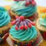 Sour Octopus cupcakes make the perfect fun treat for kids. These are perfect cupcakes for kids are always a hit with their bright colors and slightly sour additions.