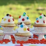 With delicious flavors in a bite sized cake, these M&M Cupcakes are the perfect idea for your summer get together! - Teaspoon of Goodness