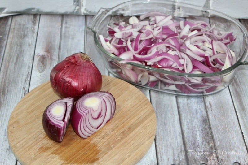 Sliced red onions being prepped for a basic french onion soup recipe.