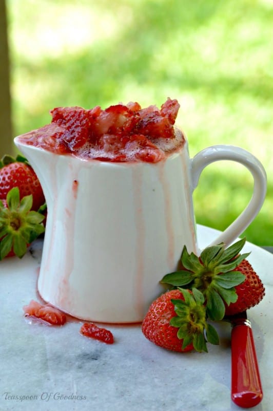 Easy Strawberry Topping in a white pitcher. 