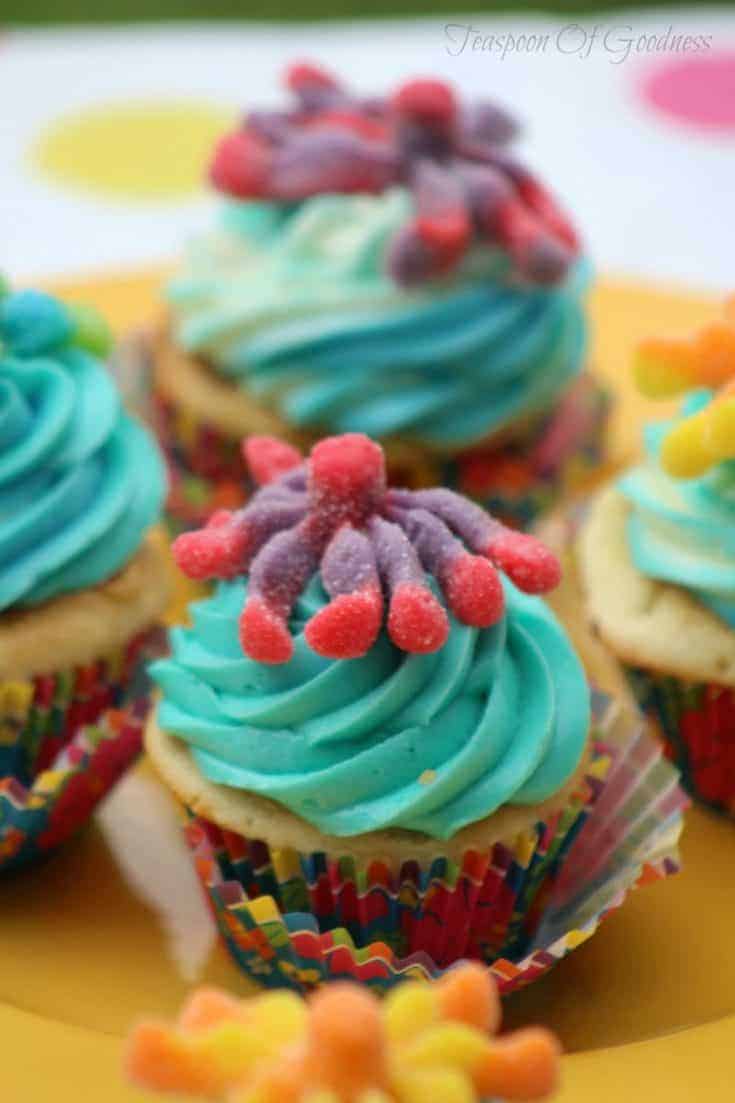 Sour Octopus cupcakes make the perfect fun treat for kids. These are perfect cupcakes for kids are always a hit with their bright colors and slightly sour additions.