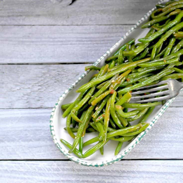 Italian Seasoned Green Beans In A Serving Dish