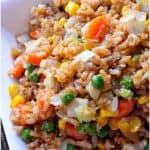 I am totally in love with this healthy easy fried rice recipe! Just because it is fried doesn't mean it can't be healthier, and this recipe proves that point. - Teaspoon of Goodness