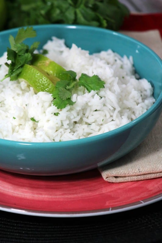 This Cilantro Lime Rice recipe is truly delicious, easy and of course a favorite side for tacos, enchiladas or simply grilled chicken or fish. - Teaspoon Of Goodness