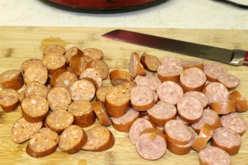 A great Cajun Sausage & Red Beans Recipe is an ideal dish for cool nights. Not only will it be hot and hearty over a bowl of rice, it is a great way to kick up the flavor in your menu plan. - Teaspoon of Goodness