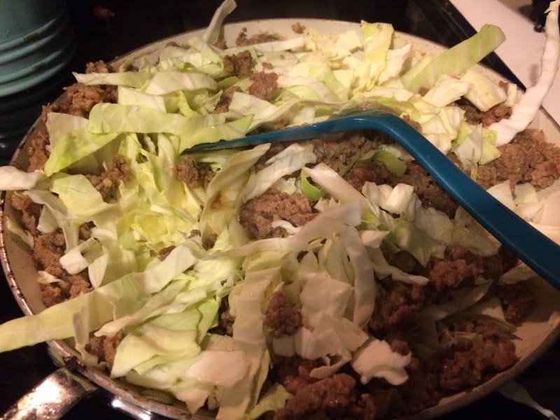 Cabbage and Sausage with Noodles is a great easy to throw together meal that is ideal for those nights when you don't feel like cooking but want something comforting. - Teaspoon of Goodness