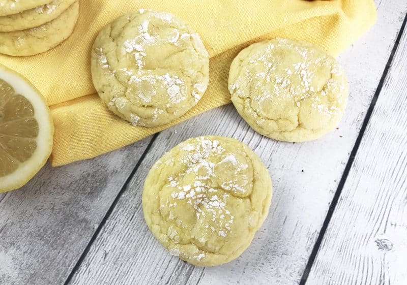 3 semi-homemade lemon cookies on a yellow and white background.