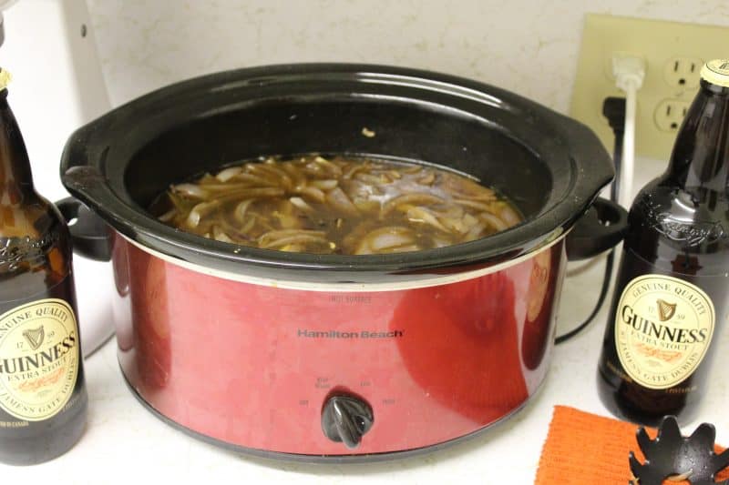 A basic french onion soup recipe prepped in a crockpot with Guinness beer.