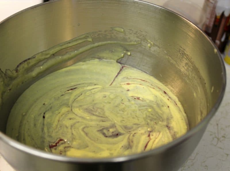 Lemon blueberry cupcake batter in a kitchenaid mixing bowl. 