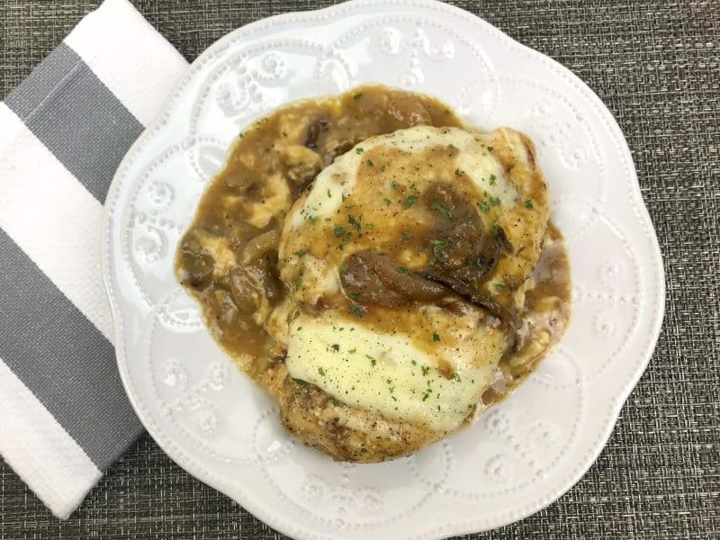 Easy french onion chicken skillet on a white plate. 